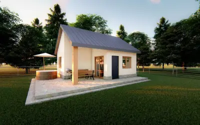 Domek murowany 35m2 koszt budowy: przytulny domek z tarasem, jacuzzi i grillem, otoczony zielenią.